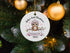 Round Christmas ornament featuring Southern Sass Custom design for baby’s first holiday