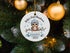 Round Christmas ornament featuring an owl for a personalized baby’s first Christmas