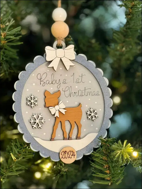 Handmade wooden keepsake featuring Baby’s First Christmas deer ornament as personalized holiday decoration