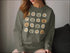 Olive green daisy long sleeve sweatshirt with pumpkin pattern for autumn style