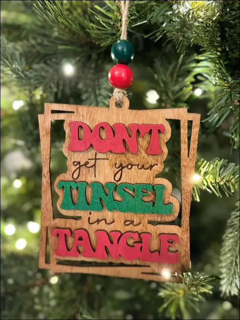 Humorous handmade wooden Christmas ornament with funny message for festive decor