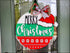 Elegant Merry Christmas Door Hanger with Santa Hat Sweater for festive holiday decor