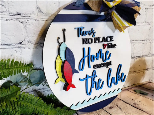 Hand painted lake house decor door hanger sign featuring a round lake theme