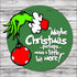 Hand painted wooden sign featuring Grinch-themed Christmas decoration for holiday decor