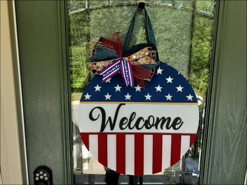 Hand painted wooden welcome sign featuring American Flag door decor for patriotic homes