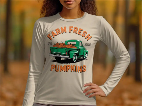 Long-sleeved sweatshirt featuring hand-picked farm fresh pumpkins truck design for fall