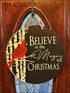 Handcrafted Christmas Door Decor featuring a festive wood door hanger for holiday charm