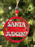 Handmade Santa Judgin Ornament in red and white, perfect for unique Christmas decor