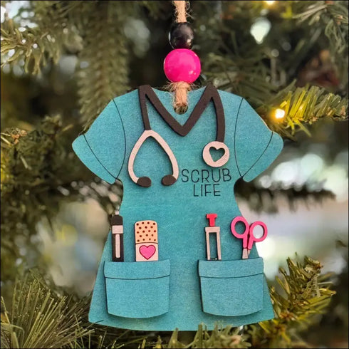 Teal scrub ornament featured in a Personalized Scrub Life Wooden Christmas Ornament