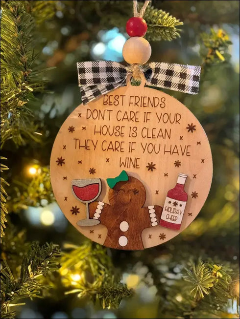 Handmade wooden Christmas ornament featuring gingerbread man, wine glass, and bottle