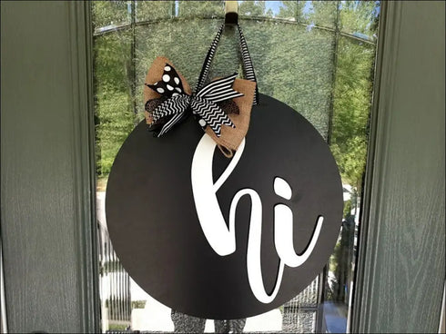 Black round handpainted door hanger with hi and decorative bow for farmhouse style decor