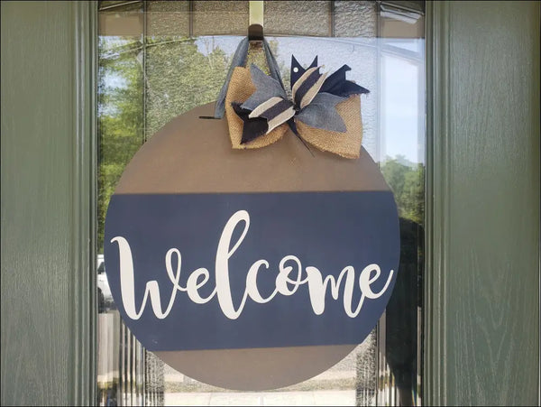 Round welcome sign with bow, perfect as a customizable porch decoration or door hanger sign