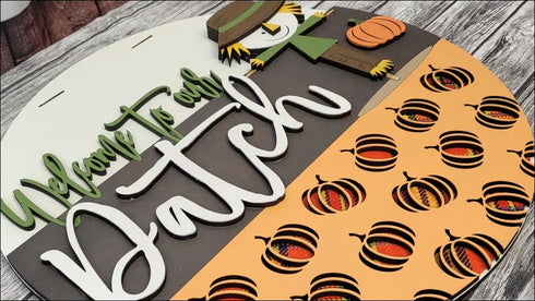 Handpainted Fall-themed round door hanger for autumn home decor featuring rustic pumpkin patch