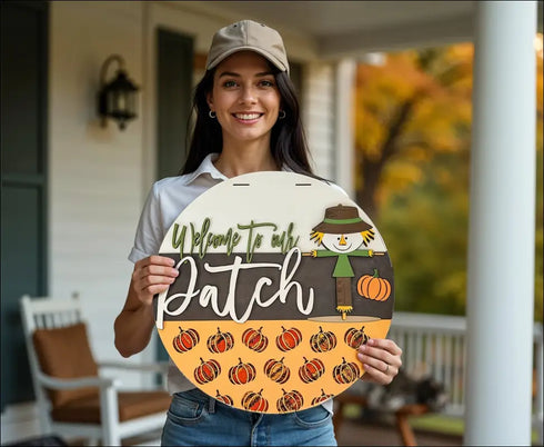 Round fall-themed door hanger for autumn home decor featuring rustic pumpkin patch design