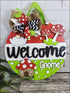 Handpainted wood door hanger sign featuring gnome themed decor and cute mushroom decorations