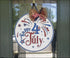 Patriotic July 4th door hanger featuring a hand painted wooden sign for Independence Day