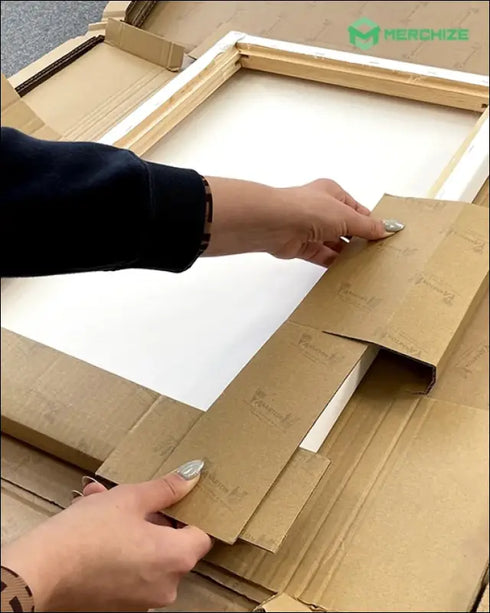 Unboxing favorite place canvas print: removing cardboard from framed couple’s art