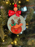Personalized Christmas ornament featuring a handmade wooden reindeer design
