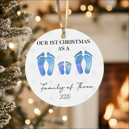 Personalized Our First Family Christmas ceramic ornament with blue footprints