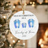 Personalized Our First Family Christmas ceramic ornament with blue footprints