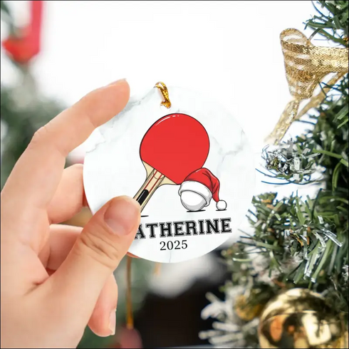 High-quality white ceramic personalized ping pong ornament with red and white ball and Santa hat