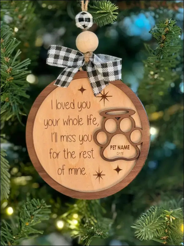 Personalized Pet Loss Ornament featuring paw print and halo for memorial Christmas decoration