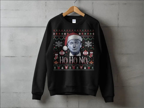 Black Christmas sweater featuring Donald Trump in a Santa hat for political Christmas fun