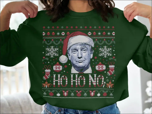 Green Christmas sweater featuring Donald Trump in a Santa hat for political Christmas fun