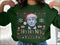 Green Christmas sweater featuring Donald Trump in a Santa hat for political Christmas fun