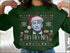 Green Christmas sweater featuring Donald Trump in a Santa hat for political Christmas fun