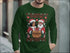 Green Christmas sweater featuring Political Holiday Humor T-Shirt for a funny Christmas debate