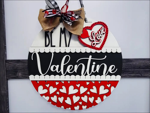 Valentine’s Day door hanger sign features heart shape and bow for romantic love decor