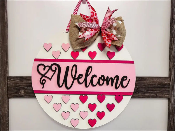 Valentine’s Day door hanger sign with hearts and bow, perfect rustic wall decor