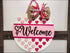 Valentine’s Day door hanger sign with hearts and bow, perfect rustic wall decor