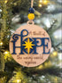 Wooden Christmas ornament with Hope text, a handmade tree decoration for the holidays